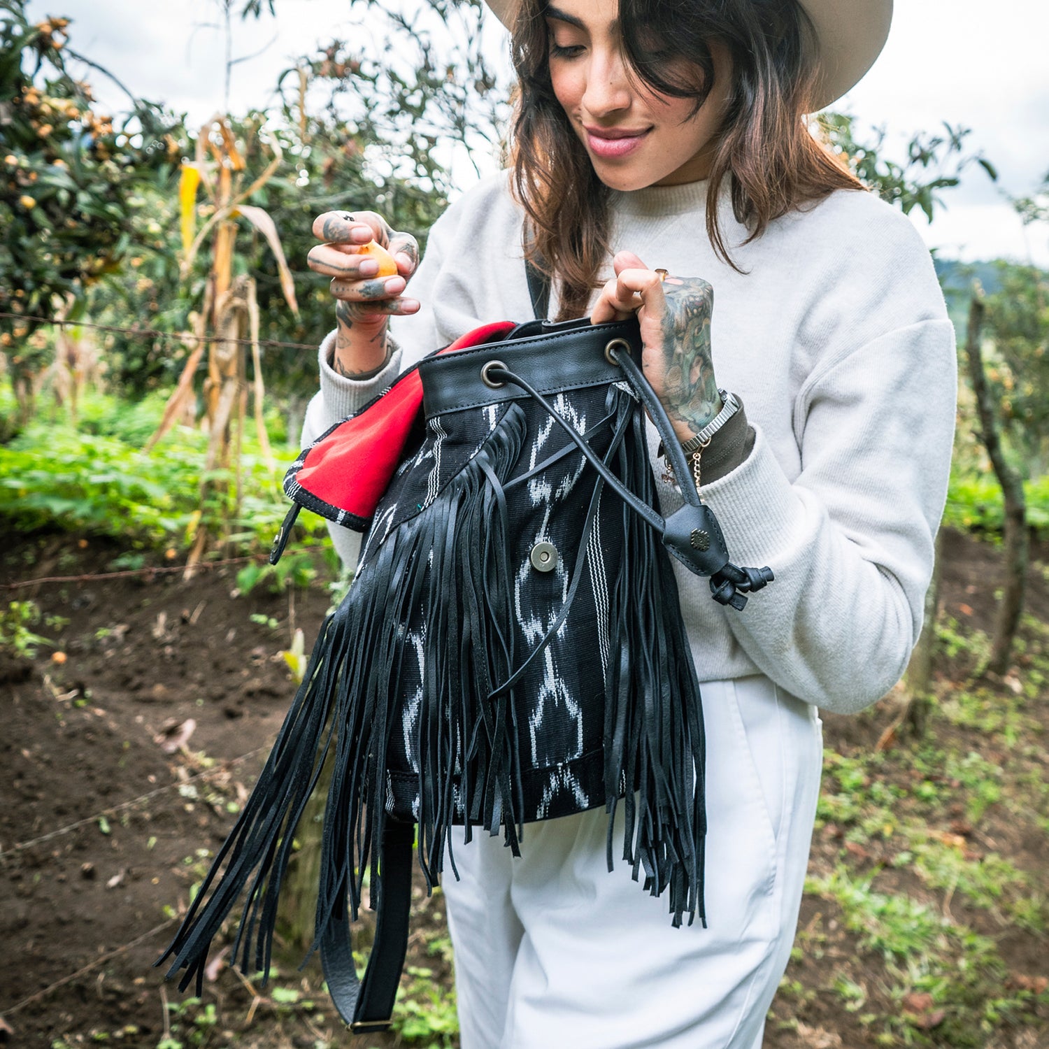 black fringe backpack