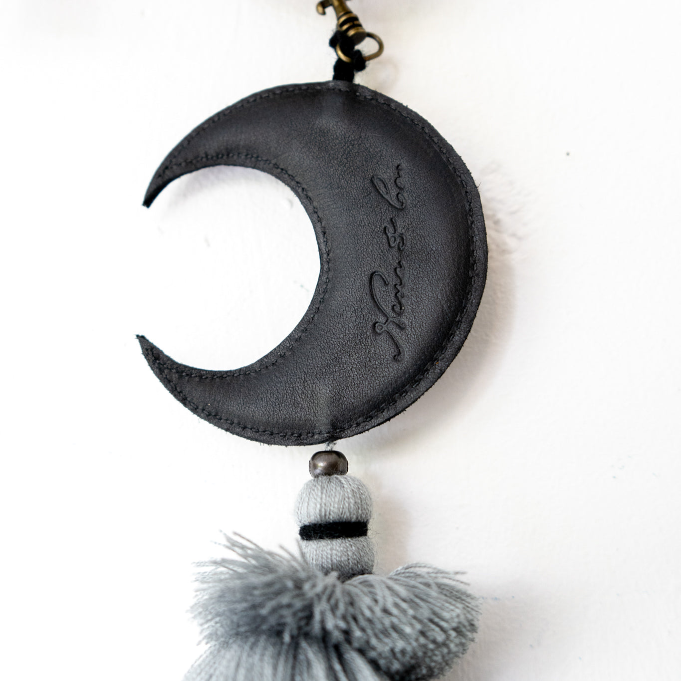 MOON CHARM WITH TASSEL - BLACK